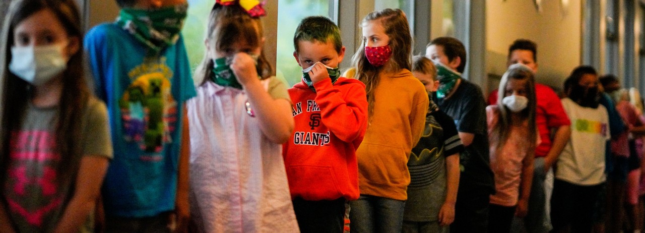 Students and children wearing masks during the Covid-19 pandemic.