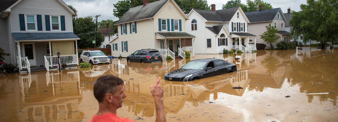 An evacuated resident&nbsp;points in the direction of his home following a flash flood, which came as Tropical Storm Henri made&nbsp;landfall, in Helmetta, New Jersey&nbsp;on August 22, 2021. (Photo: Tom Brenner/AFP via Getty Images)