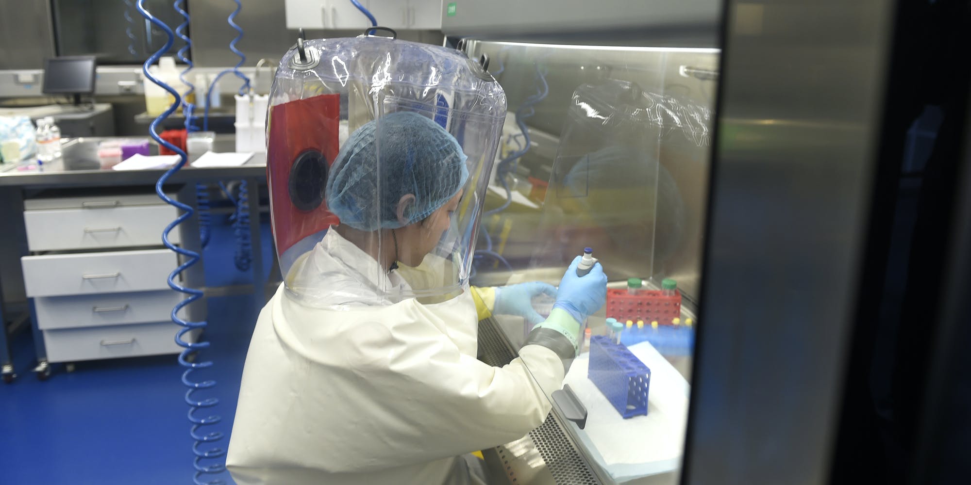A researcher works in a lab of Wuhan Institute of Virology (WIV) in Wuhan in central China's Hubei province Thursday, Feb. 23, 2017. (FeatureChina via AP Images)