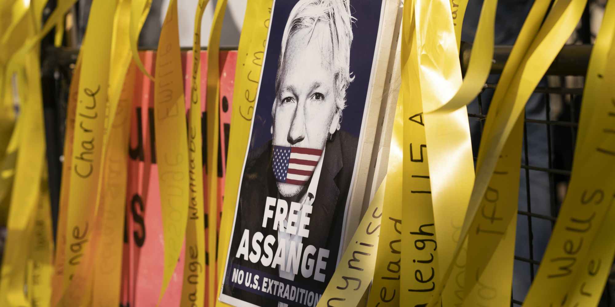 Supporters gather as England’s High Court hears a U.S. appeal in the extradition case of WikiLeaks founder Julian Assange, on Aug. 11, 2021, in London.