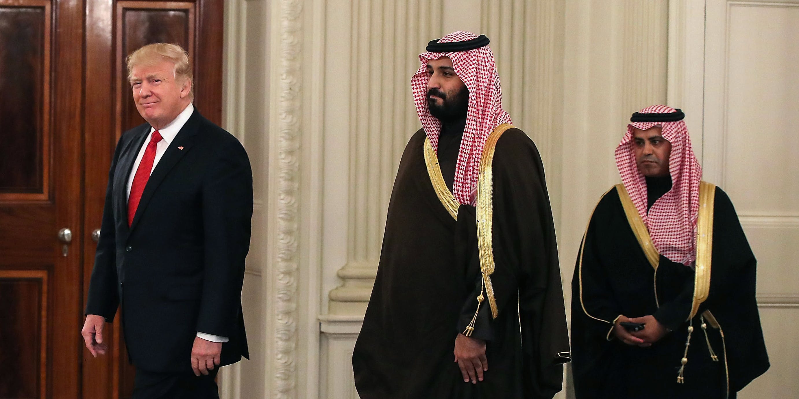 WASHINGTON, DC - MARCH 14: U.S. President Donald Trump (L) walks into the State Dinning Room to have lunch with Mohammed bin Salman (C), Deputy Crown Prince and Minister of Defense of the Kingdom of Saudi Arabia, at the White House, March 14, 2017 in Washington, DC.  (Photo by Mark Wilson/Getty Images)