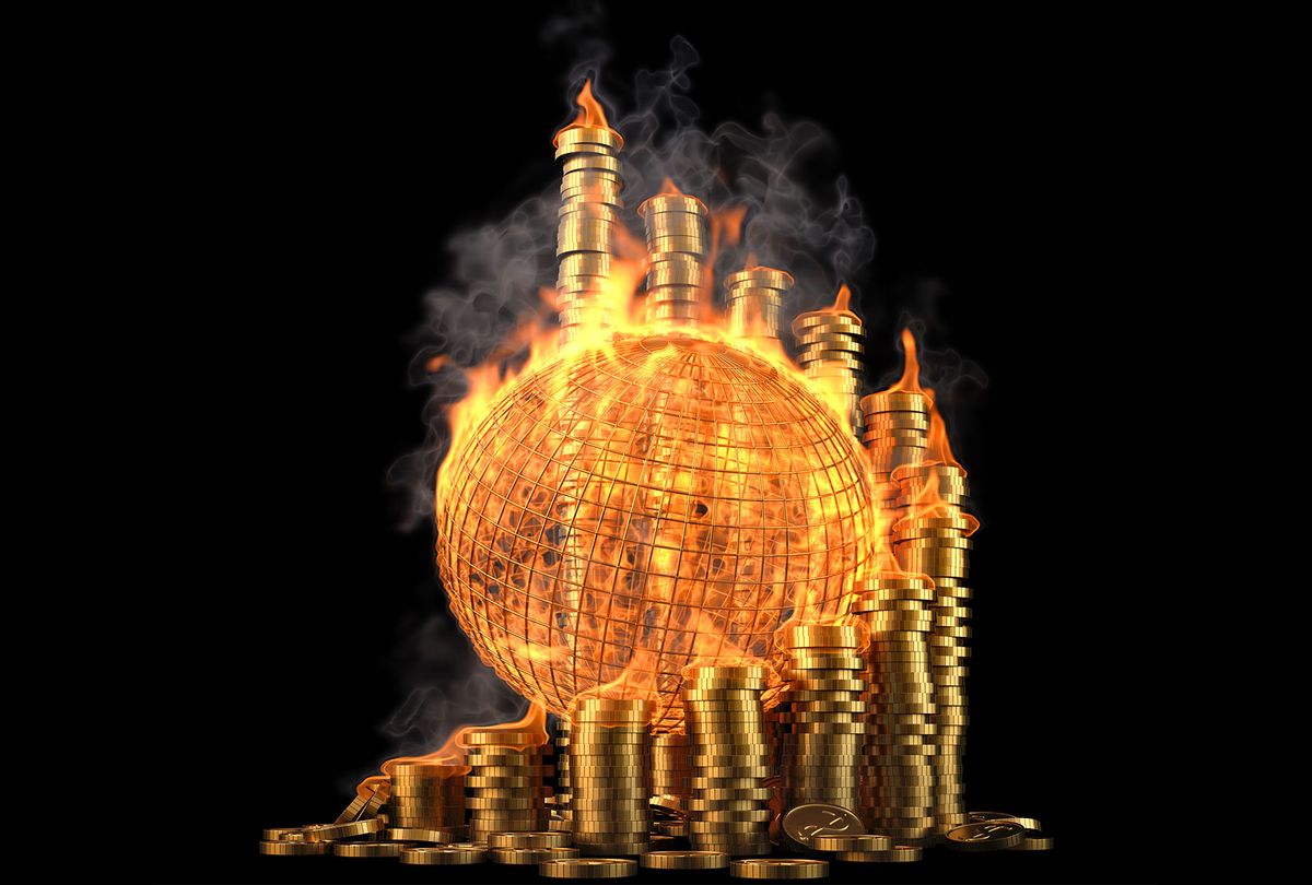 World and money burning (Getty Images/dimdimich)