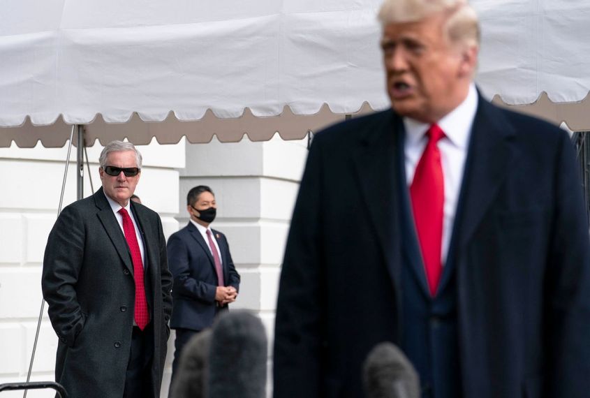 White House Chief of Staff Mark Meadows listens as President Donald Trump speaks to the press outside the White House on October 30, 2020 in Washington, DC. President Trump will travel to Michigan, Wisconsin and Minnesota for the campaign rallies ahead of the presidential election on Tuesday. (Sarah Silbiger/Getty Images)
