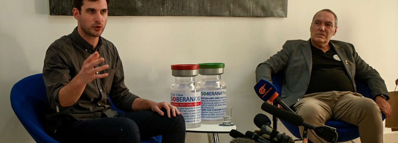 Progressive International's general coordinator David Adler (L) and Dr. Vicente Vérez Bencomo, director general of the Finlay Institute of Vaccines, talk during a press conference at the Finlay Institute on Havana, on January 24, 2022. 