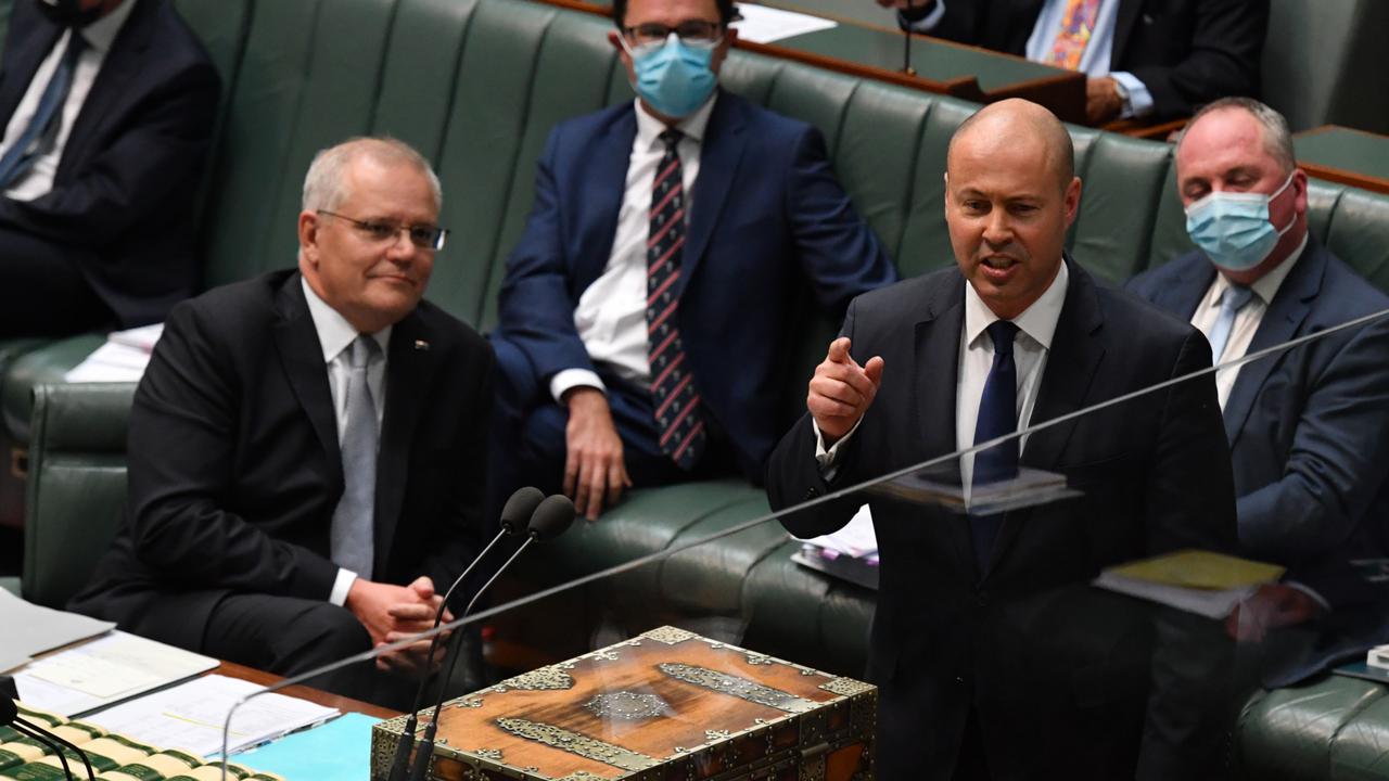 Scott Morrison watches as Josh Frydenberg hands down the 2022-23 Budget.