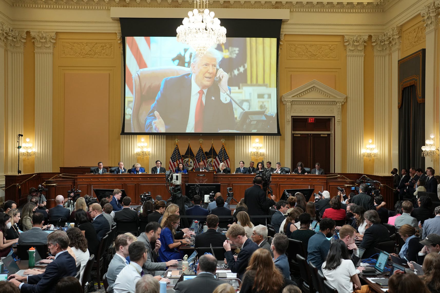 An image of former President Donald Trump displayed on a screen during a hearing of the Select Committee to Investigate the January 6th Attack on the US Capitol in Washington, D.C., July 12, 2022. Whether far-right extremists who attacked the US Capitol were encouraged by or even conspired with then-President Trump will be the subject of today's hearing by the House committee investigating the riot. Photographer: Doug Mills/The New York Times/Bloomberg via Getty Images