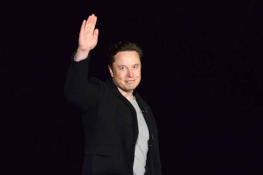 Elon Musk waves while providing an update on Starship, on Feb. 10, 2022, near Brownsville, Texas. Twitter on Thursday, Dec. 15, 2022.