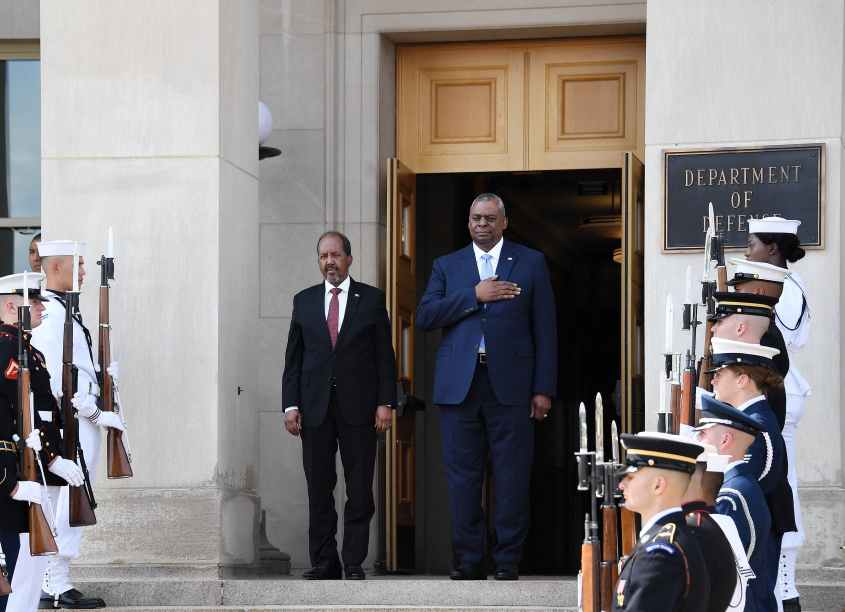 Somali President Hassan Sheikh Mohamud (L) and US Defense Secretary Lloyd Austin attend a  welcoming ceremony before talks at the Pentagon in Washington, DC, on September 15, 2022. (Photo by OLIVIER DOULIERY / AFP) (Photo by OLIVIER DOULIERY/AFP via Getty Images)