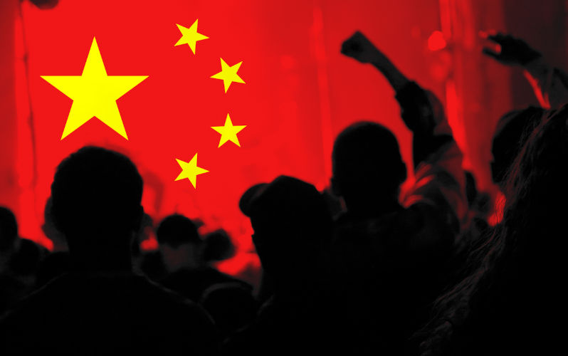 Crowd-people.-Chinese-flag. Image: iStock Crowd people. Chinese flag.