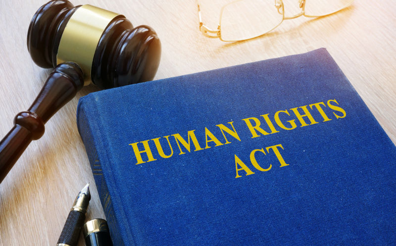 Human Rights Act and gavel on a table. concept