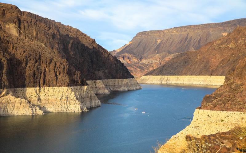 Scenic-view-of-water-storage-between-the-canyons-in-Hoover-Dam,-Nevada. Image: iStock Canyon at Lake Mead in Arizona seen from the Hoover Dam with a receding water level.
