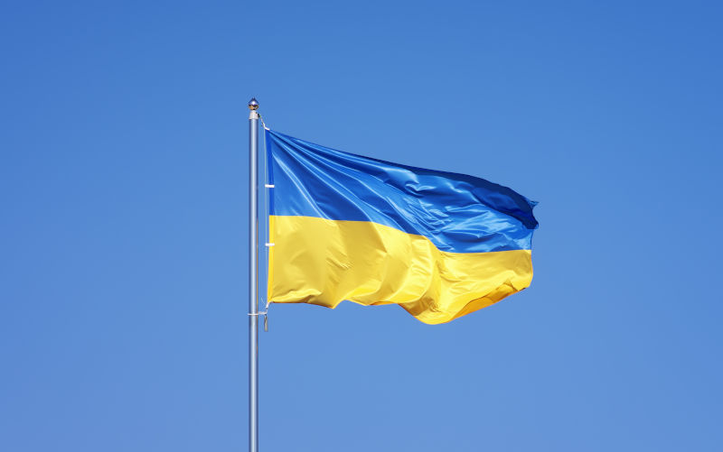 Ukrainian-flag. Image: iStock Ukrainian flag on blue sky backgroud.