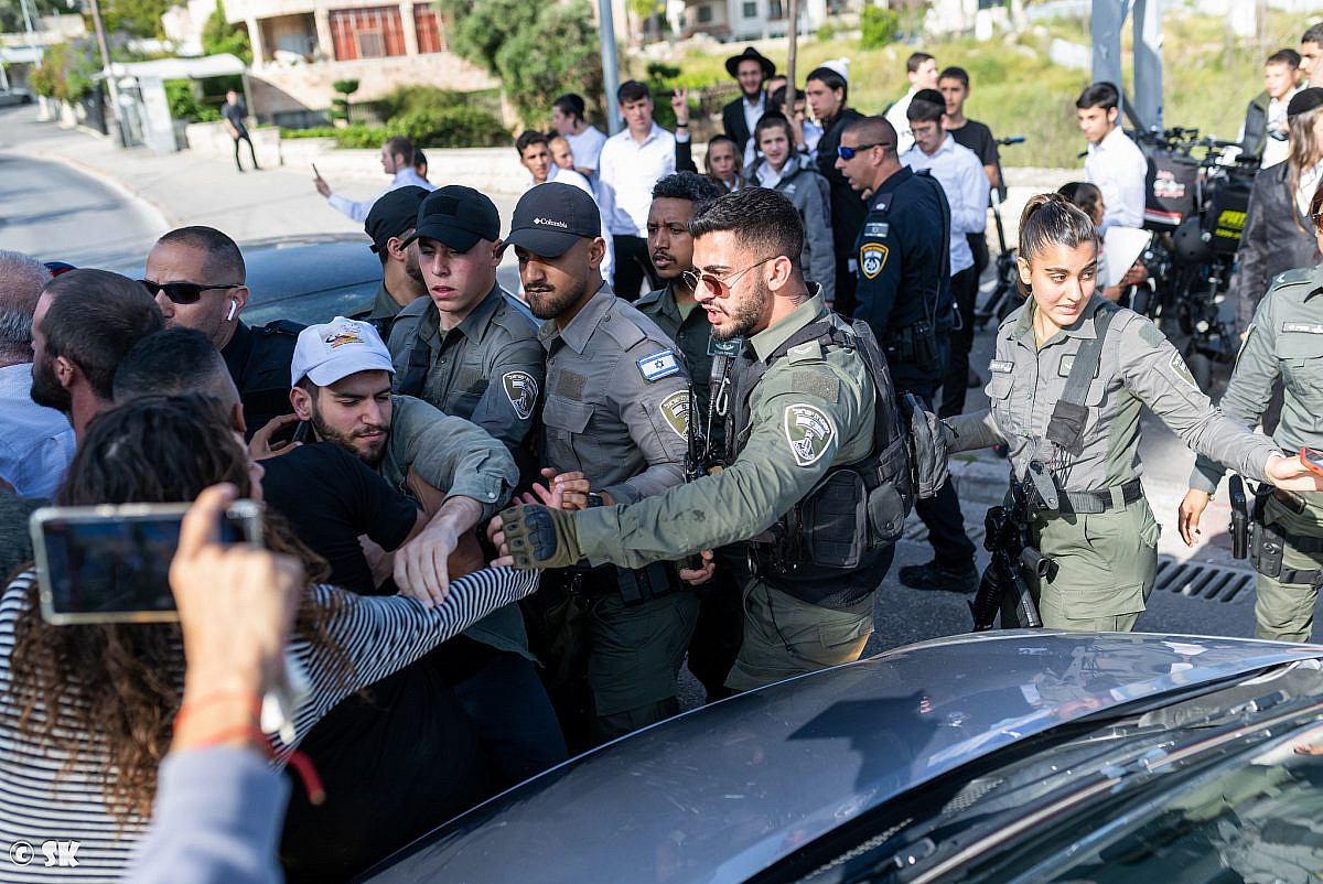 Police arrest Gil Hammerschlag at a protest in Sheikh Jarrah, occupied East Jerusalem, April 2, 2023. (Shai Kendler/Megaphone News) Police arrest Gil Hammerschlag at a protest in Sheikh Jarrah, occupied East Jerusalem, April 2, 2023. (Shai Kendler/Megaphone News)