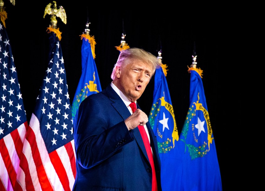 LAS VEGAS, NEVADA  - JULY 8: President Donald Trump pumps his fist after taking the stage prior to speaking at a Nevada Volunteer Recruitment Event at Fervent Calvary Chapel Church Saturday, July 8, 2023, in Las Vegas. (Photo by Ronda Churchill for The Washington Post via Getty Images)