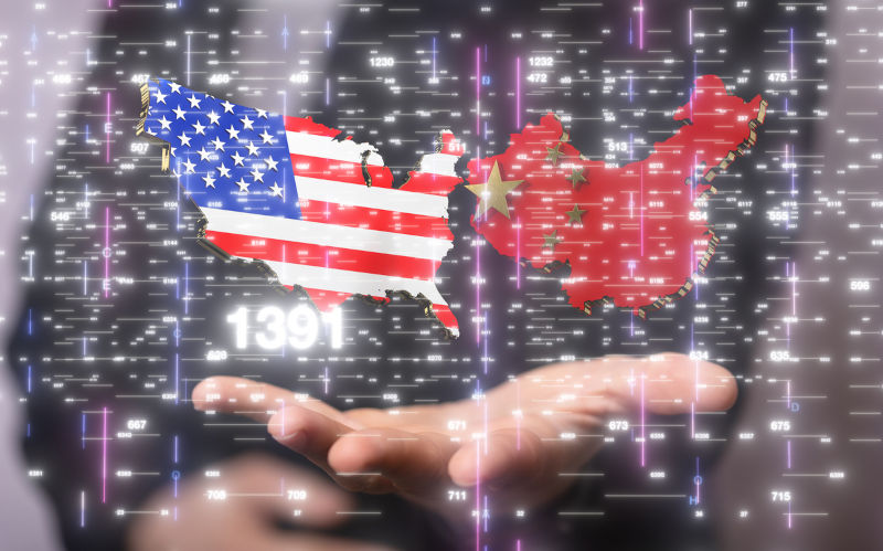 Hands-with-3D-render-of-USA-and-China. Image: iStock / Wirestock Male hands with 3D render of USA and China.