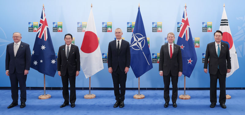 L-R) Australian Prime Minister Anthony Albanese, Japanese Prime Minister Fumio Kishida, NATO Secretary General Jens Stoltenberg, New Zealand's Prime Minister Chris Hipkins and South Korean President Yoon Suk Yeol pose for a family picture ahead of the North Atlantic Council meeting with Sweden, Indo-Pacific Partners, and the EU at the NATO ?summit in Vilnius, Lithuania, 12 July 2023. The North Atlantic Treaty Organization (NATO) Summit takes place in Vilnius on 11 and 12 July 2023 with the alliance's leaders expected to adopt new defenfe plans. Image: AAP/EPA/YONHAP SOUTH KOREA OUT