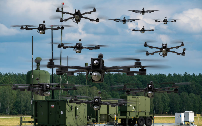 Swarm-of-combat-drones-and-command-systems. Image: iStock / MikeMareen Swarm of combat drones and command systems.