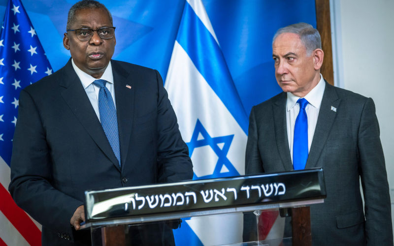 Tel Aviv, Israel. 18th Dec, 2023. U.S. Secretary of Defense Lloyd Austin, left, listens to a question during a joint press conference with Israeli Prime Minister Benjamin Netanyahu, right, following their bilateral meeting, December 18, 2023 in Tel Aviv, Israel. Image:Alamy/ Chad McNeeley/DOD Photo/Alamy Live News
