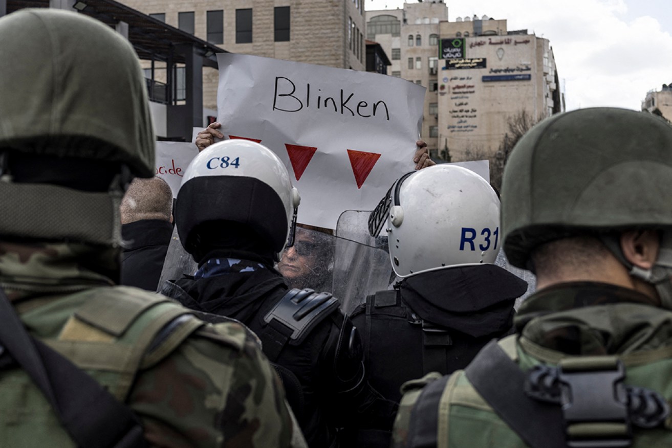 Palestinians are confronted by Palestinian Authority security forces as they protest during a visit by US Secretary of State Antony Blinken in Ramallah.