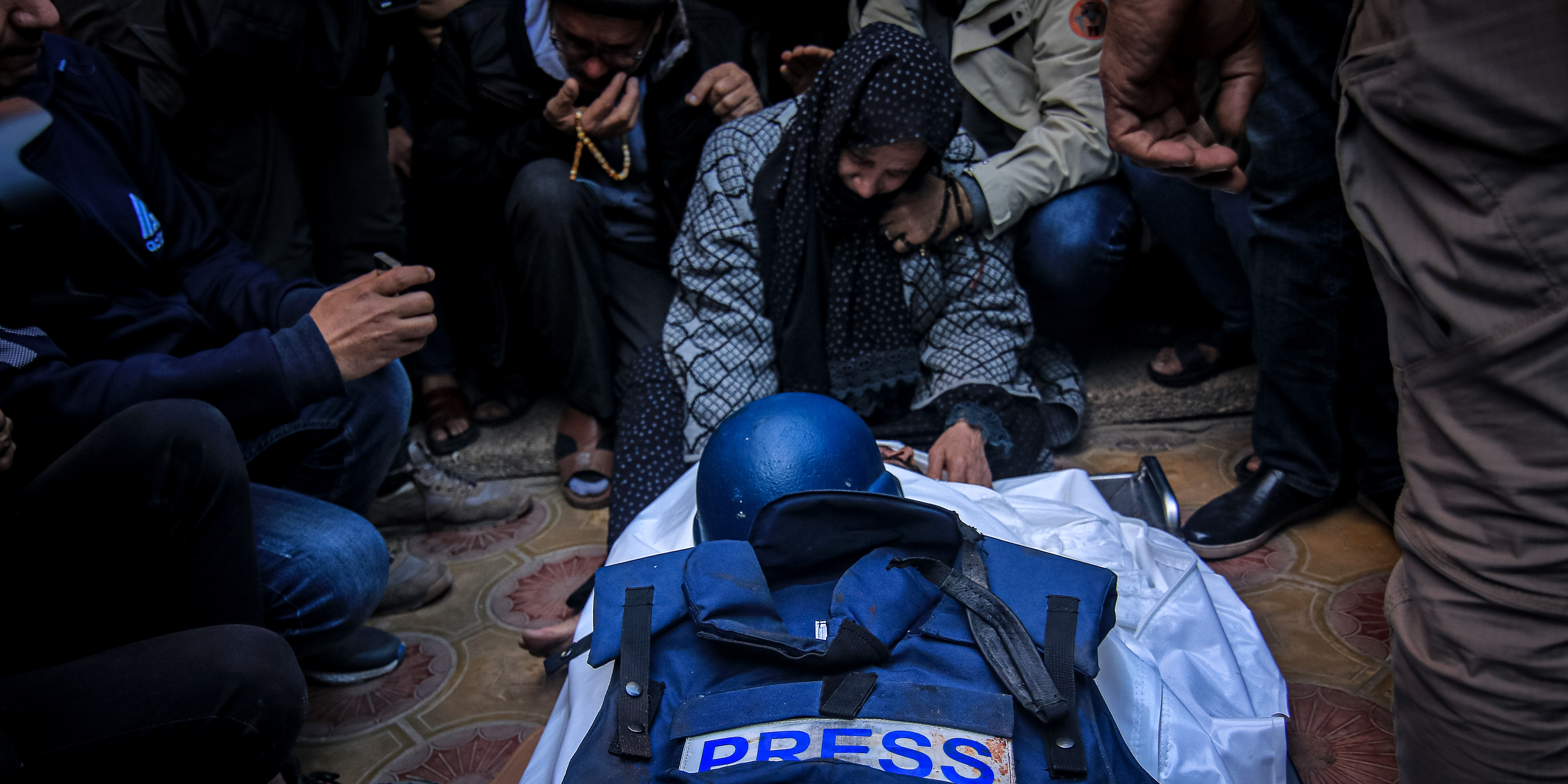 (EDITORS NOTE: Image depicts death.) Mourners at the funeral of Al Jazeera cameraman Samer Abu Daqqa in the center of Khan Younis, Gaza Strip, on Saturday, Dec. 16, 2023. On Monday, Gaza's Hamas-run health authorities put the death toll in Gaza at more than 19,400 Palestinians. Photographer: Ahmad Salem/Bloomberg via Getty Images