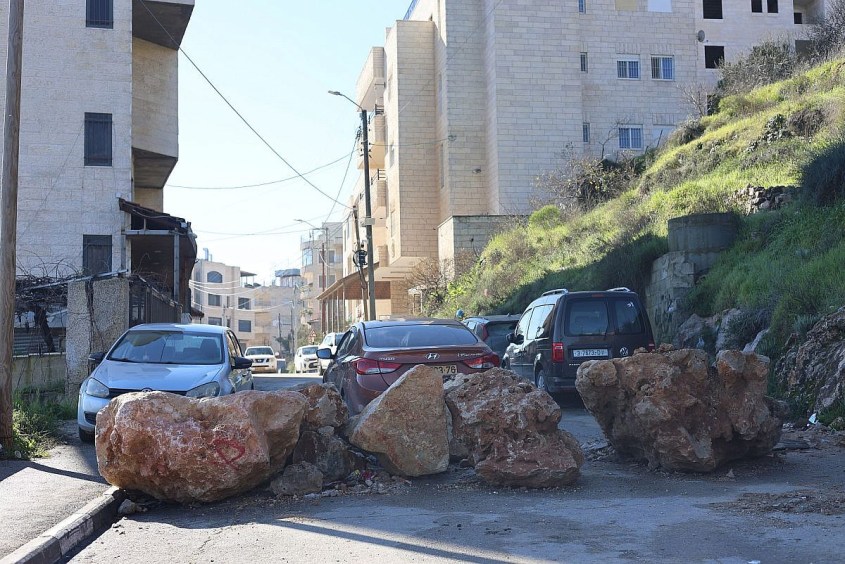 Large boulders block the entry and exit of cars outside Beit Jala, occupied West Bank. (Yuval Abraham) Large boulders block the entry and exit of cars outside Beit Jala, occupied West Bank. (Yuval Abraham)