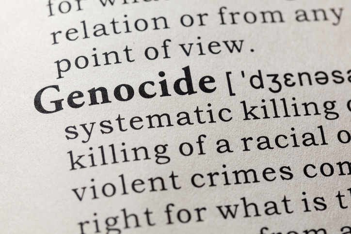 Dictionary definition of the word genocide. including key descriptive words. Image:iStock/Devonyu