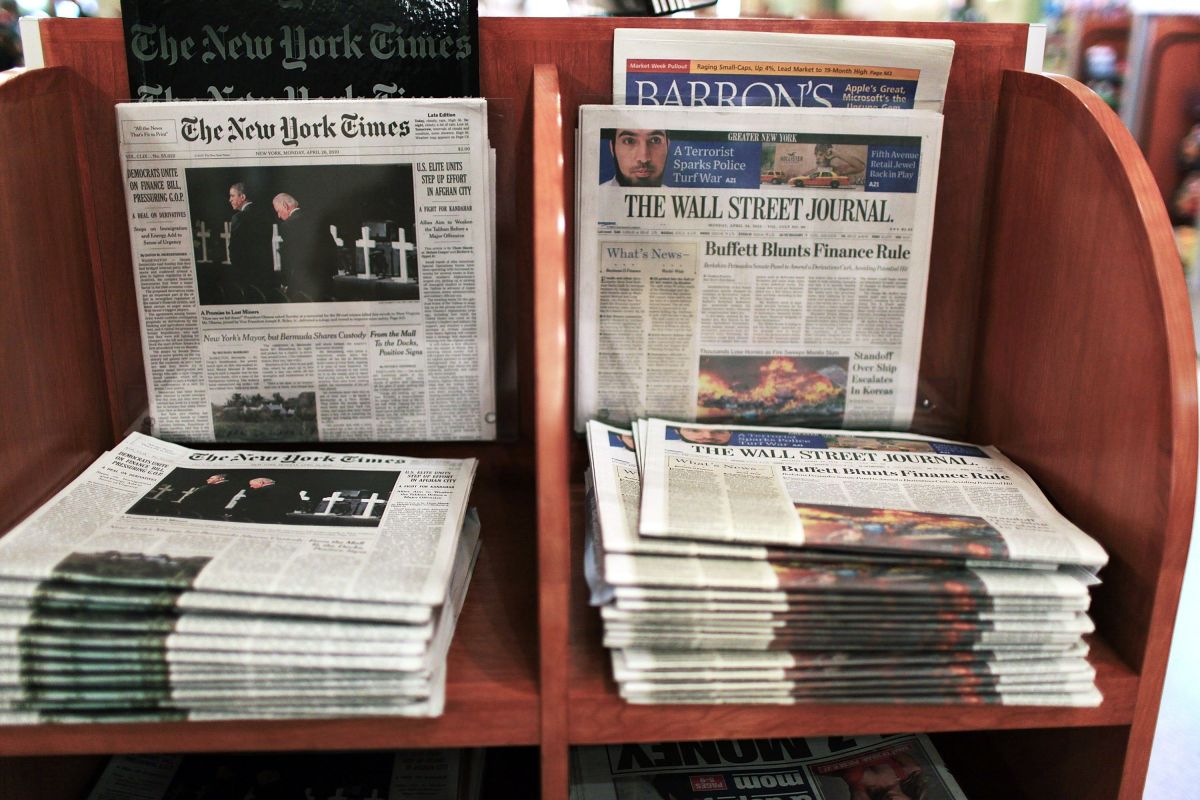 The Wall Street Journal is viewed beside The New York Times in New York City.