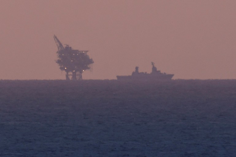 An Israeli gas platform is seen as an Israeli Navy vessel patrols in the Mediterranean off the coast of Ashkelon, Israel November 14, 2023 REUTERS/Amir Cohen