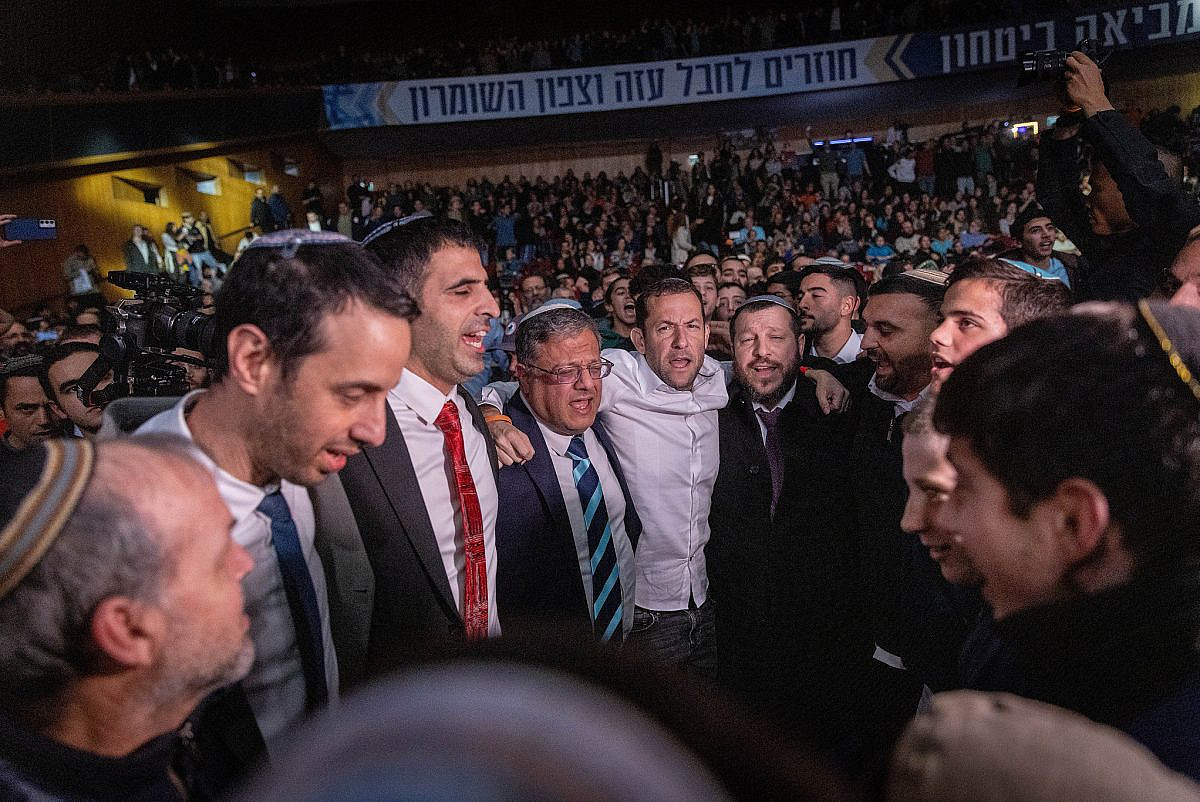 Ministers and MKs dance during the 'Victory Conference' for the resettlement of Gaza at the International Convention Center in Jerusalem, January 28, 2024. (Chaim Goldberg/Flash90)