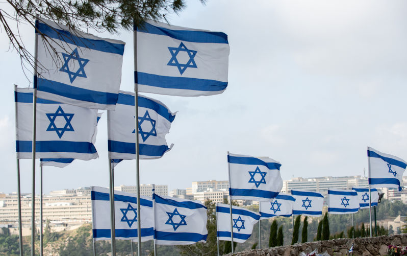 Multiple blue and white Israeli flags