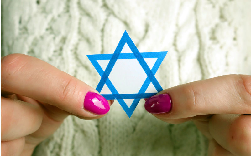 Unknown woman holding David Star. Israel, Judaism, Zionism concept