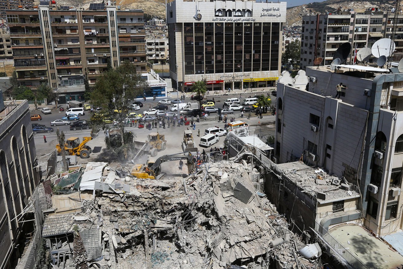 An Iranian consulate building in Damascus has been levelled in a suspected Israeli air strike.