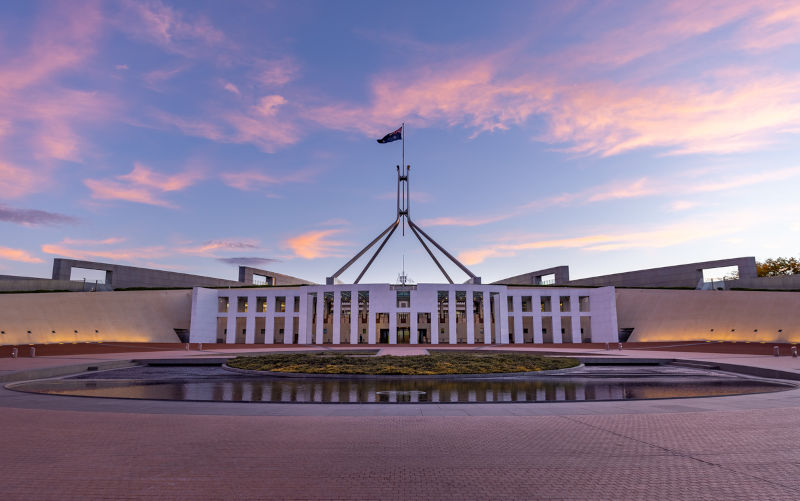 A sunset wide view of federal parliament house at Canberra in the act, Australia.