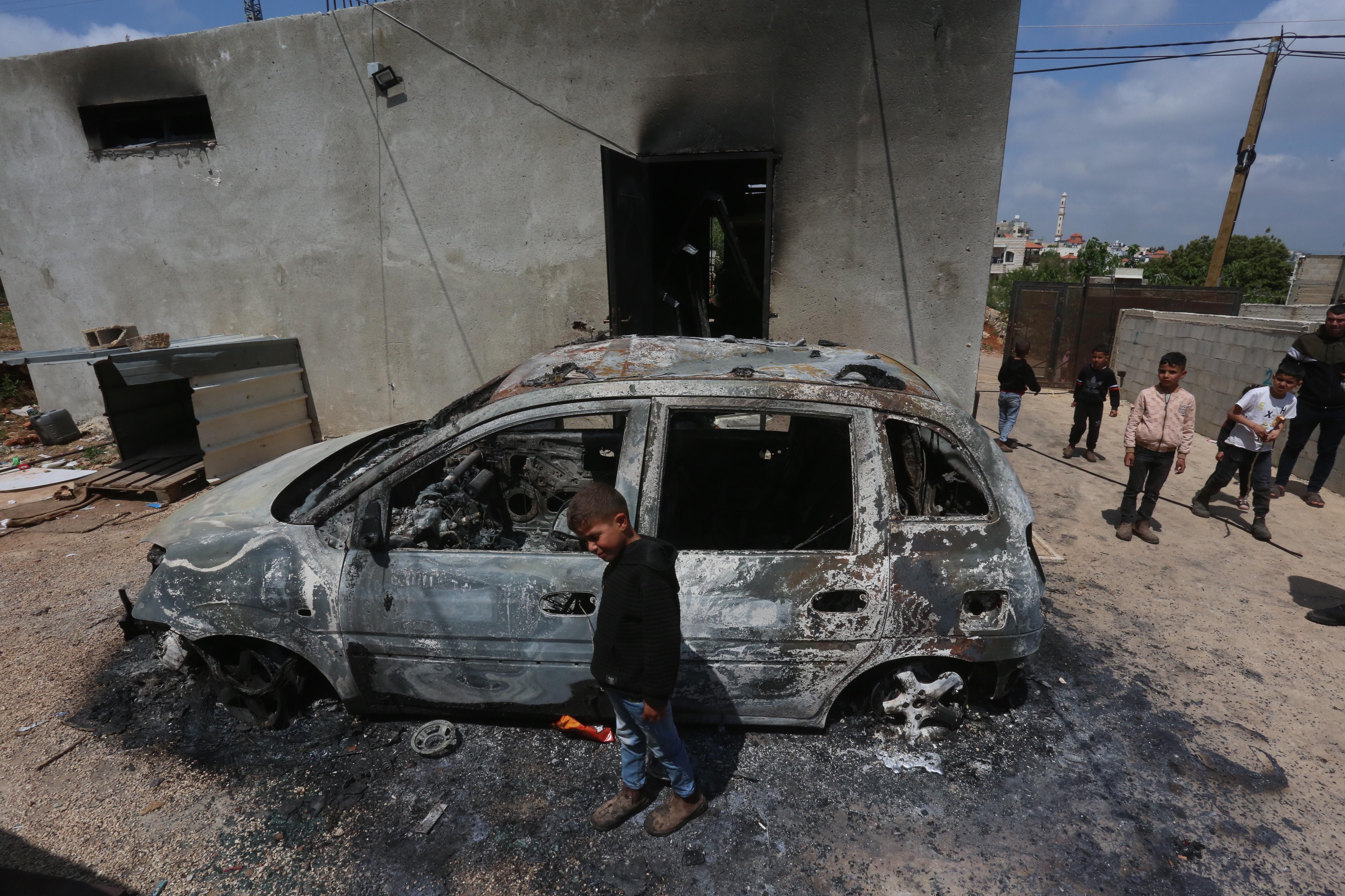 Destroyed car in West Bank