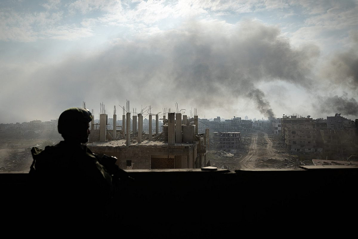 Israeli soldiers from the 8717 Battalion of the Givati Brigade operating in Beit Lahia, in the northern Gaza Strip, December 28, 2023. (Yonatan Sindel/Flash90)