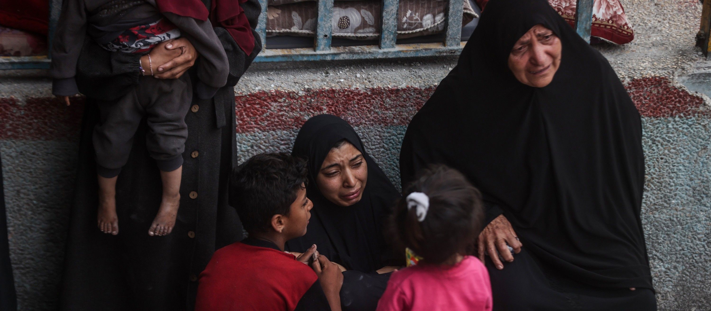 Palestinians mourn more deaths from an Israel airstrike on UNRWA school in Nuseirat Refugee Camp,
